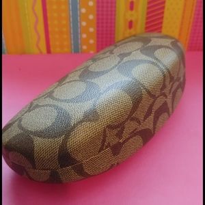 Coach case for glasses or sunglasses.